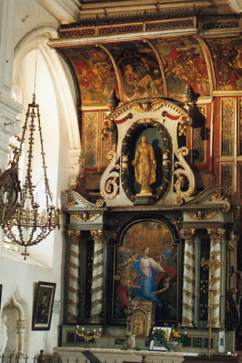 Retable XVIIe siècle de Sainte-Geneviève avec le baldaquin du jubé. ( Gérard Schorp)