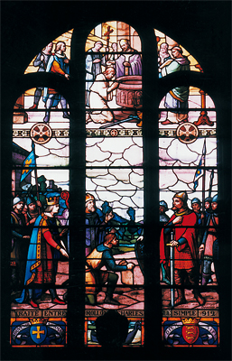 Le traité de Saint-Clair-sur-Epte est conclu à l'automne de l'année 911 entre Charles III le Simple et Rollon. Il permet l’établissement des Normands en Neustrie à condition qu’ils protègent le royaume de Charles III de toute nouvelle invasion des « hommes du Nord ». Vitrail de l'église Notre-Dame de Saint-Clair-sur-Epte (Val-d'Oise). (© Patrimoine Normand)